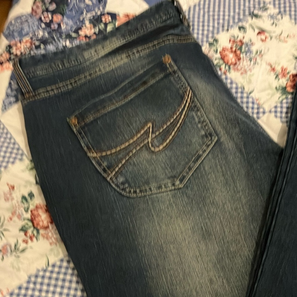 Maurices Flare Leg Jeans with Distressed Detailing